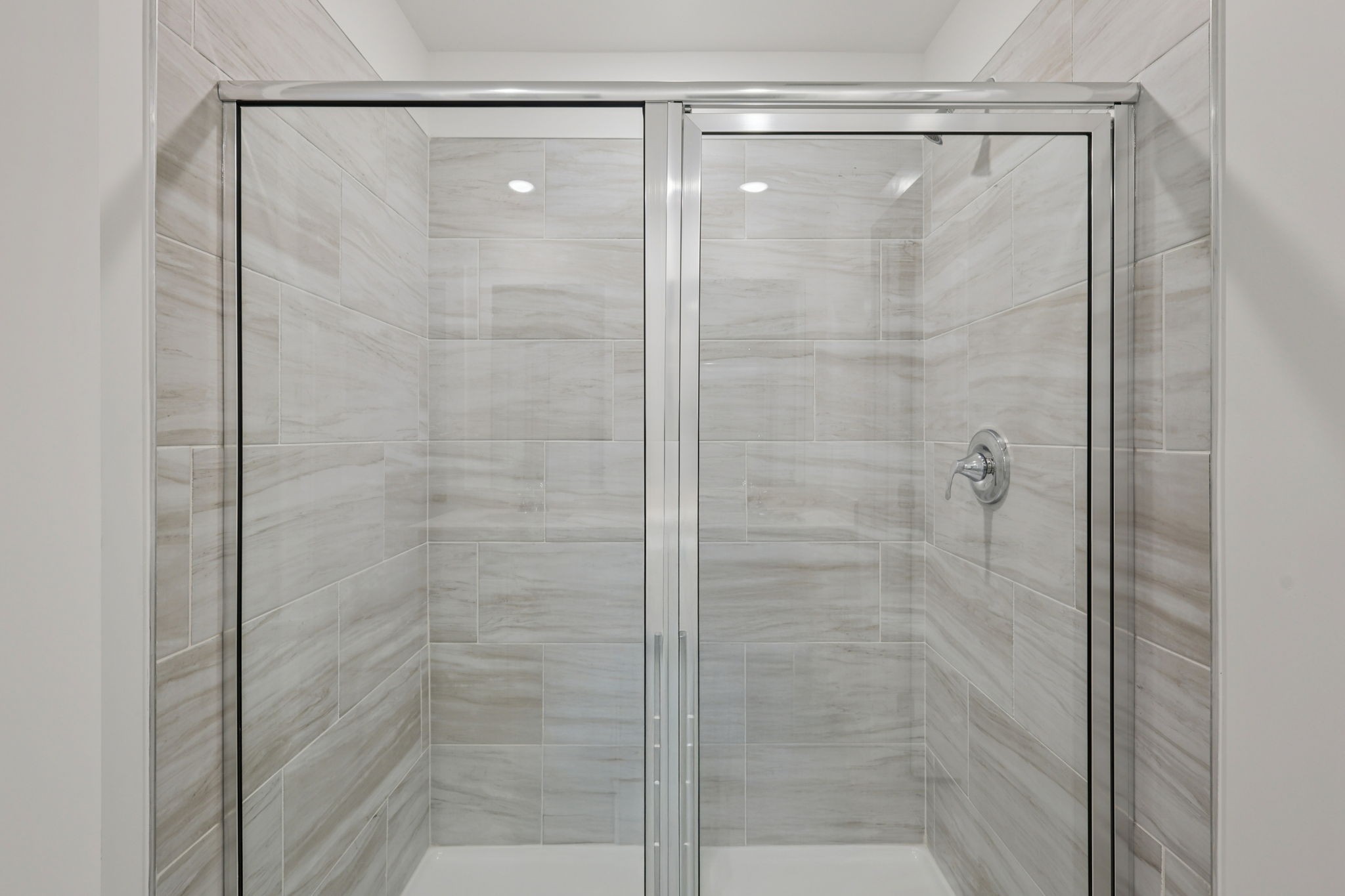 1524 Bear Branch Trace Columbia, TN 38401 - Photo 39 of 55 a bathroom with a glass shower door