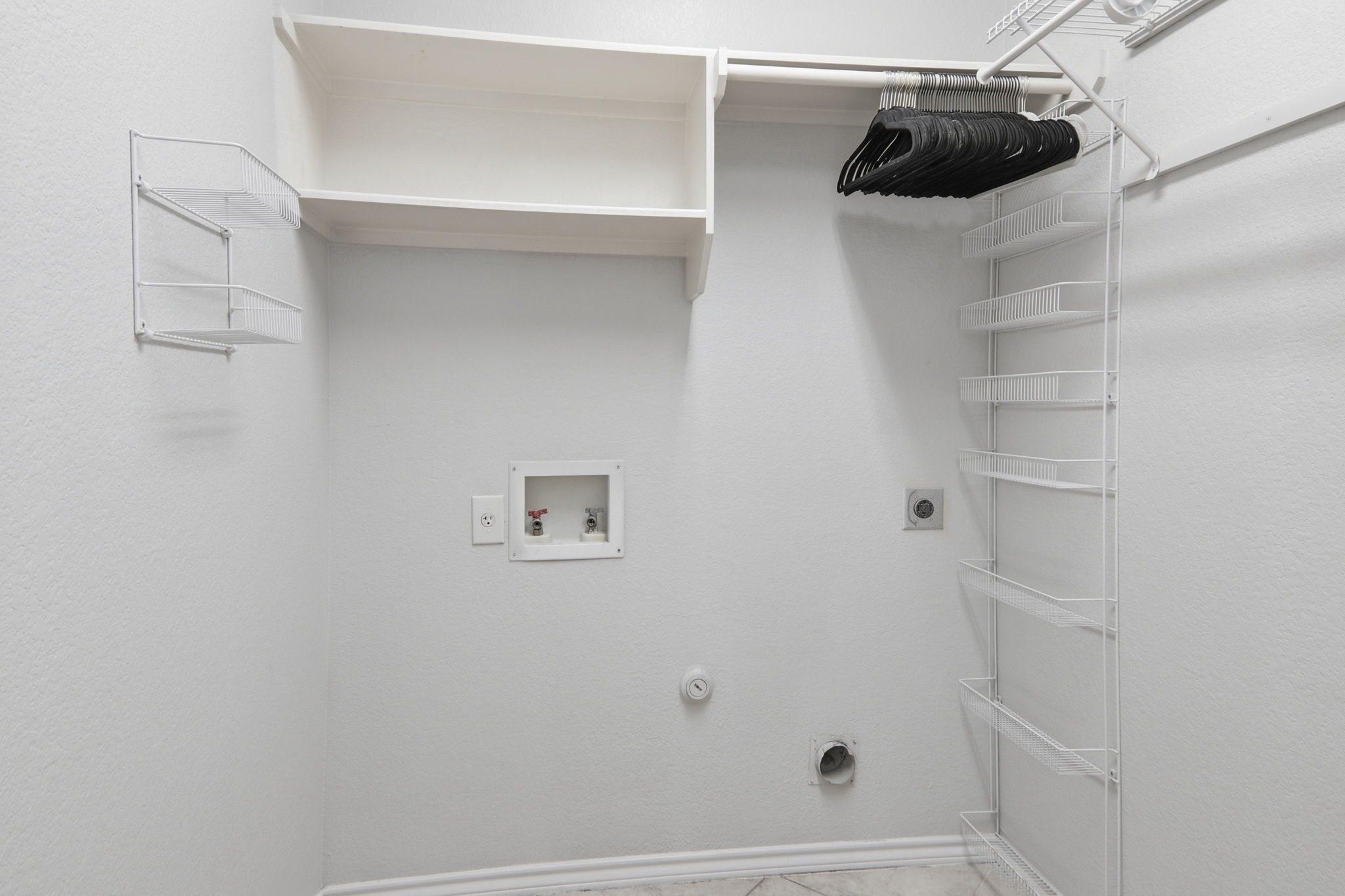 500 Red Hawk Drive Leander, TX 78641 - Photo 12 of 35 Laundry room featuring hookup for a gas dryer, washer hookup, and electric dryer hookup
