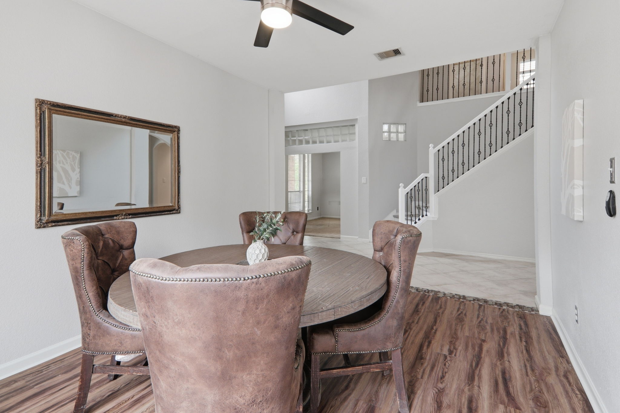 500 Red Hawk Drive Leander, TX 78641 - Photo 8 of 35 Dining room featuring ceiling fan and wood finished floors