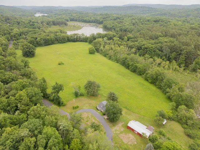 a view of a lake with a mountain in the background