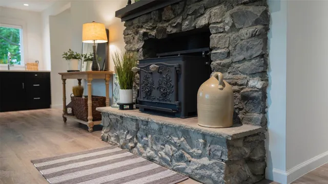 a room with fireplace and windows