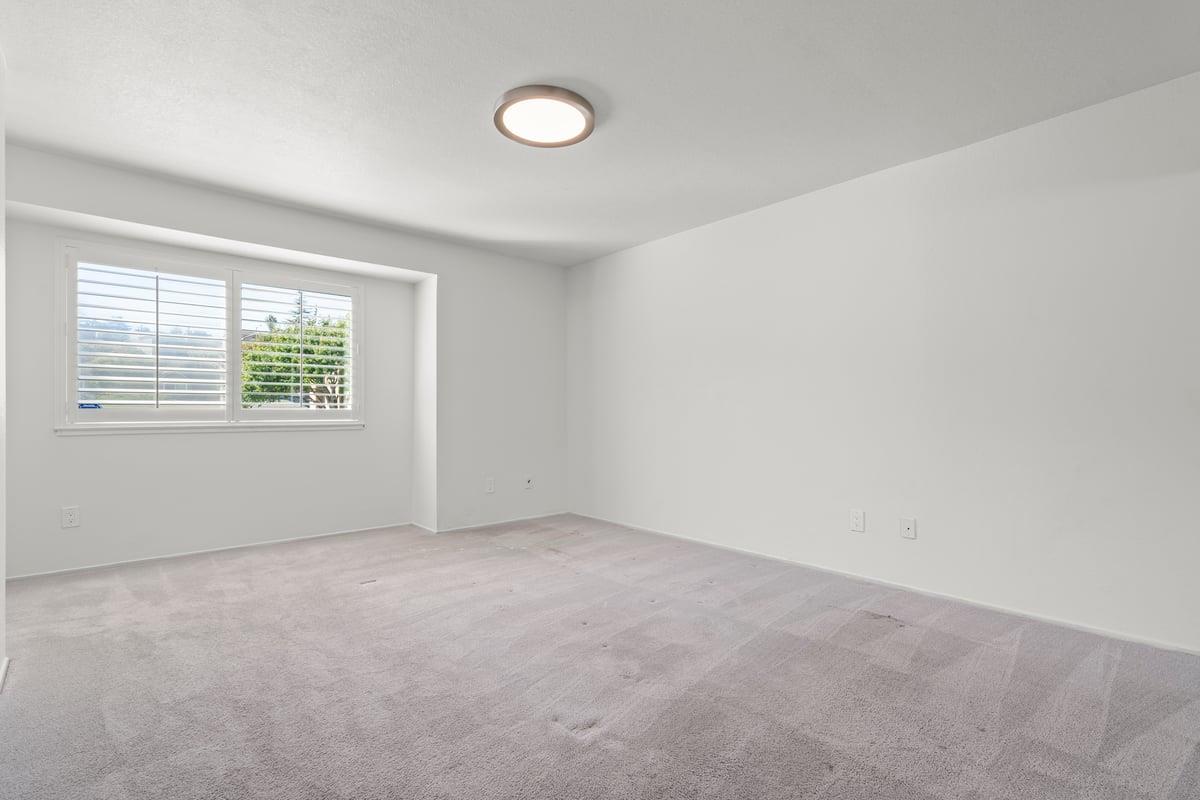 52 Winding Way Watsonville, CA 95076 - Photo 16 of 29 an empty room with windows