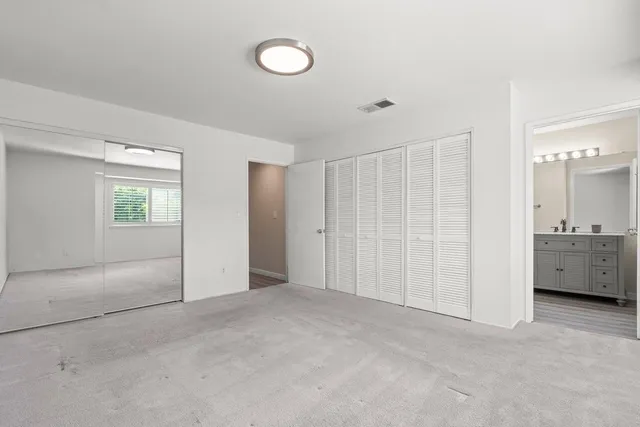 a view of empty room with a sink
