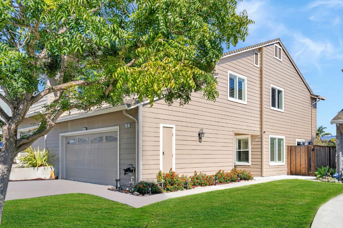 52 Winding Way Watsonville, CA 95076 - Photo 2 of 29 a view of a house with a yard and a large tree