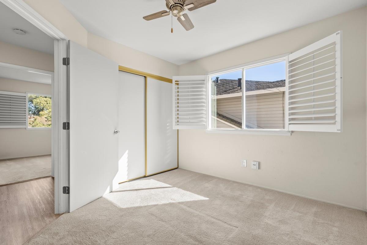 52 Winding Way Watsonville, CA 95076 - Photo 24 of 29 an empty room with windows and closet