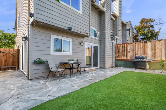 a garden view with a seating space