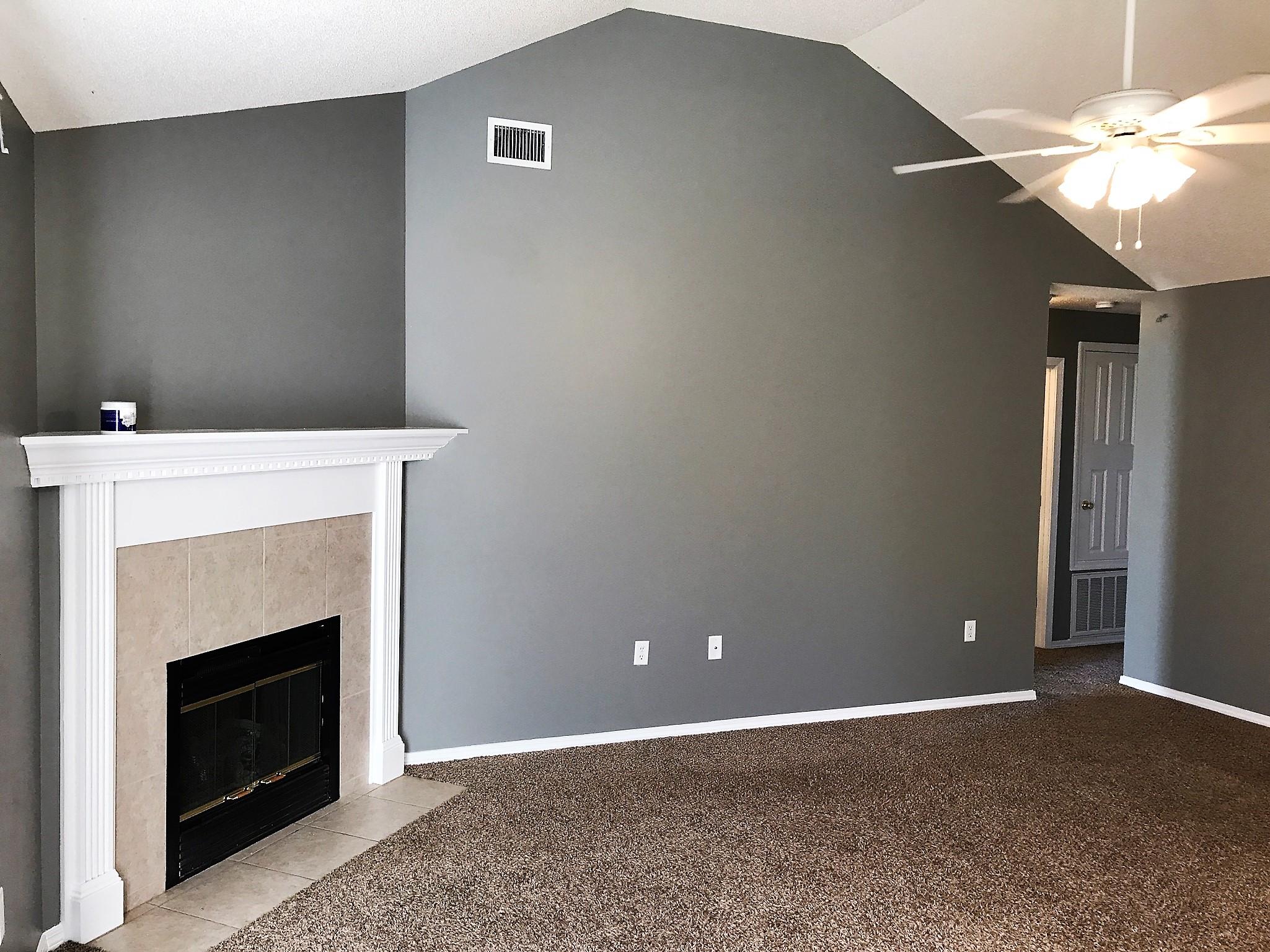 804 Travis Court Crestview, FL 32536 - Photo 3 of 22 a view of an empty room with a fireplace