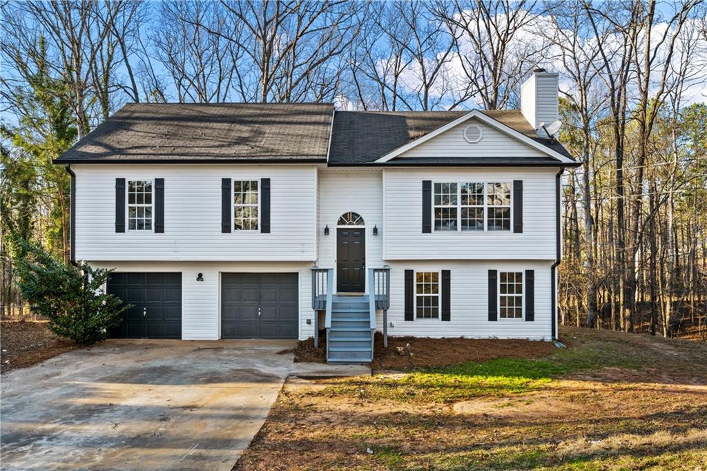 130 Sable Circle Covington, GA 30016 - Photo 1 of 1 a front view of a house with a yard