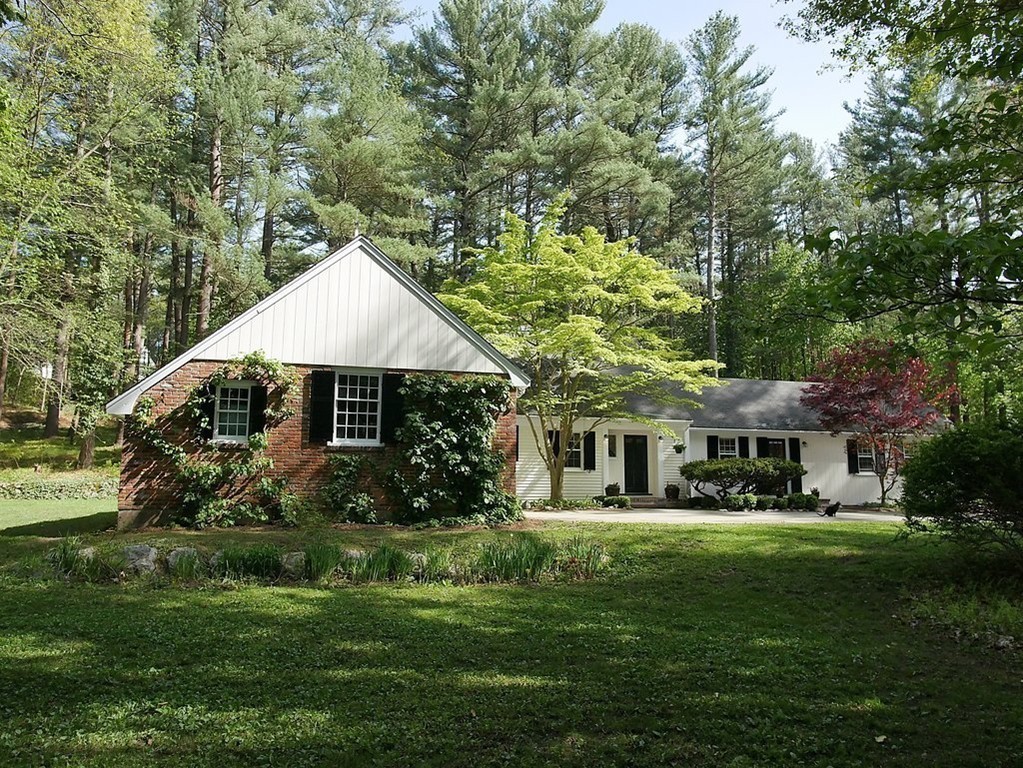 52 Montvale Road Weston, MA 02493 - Photo 1 of 30 a front view of a house with a yard