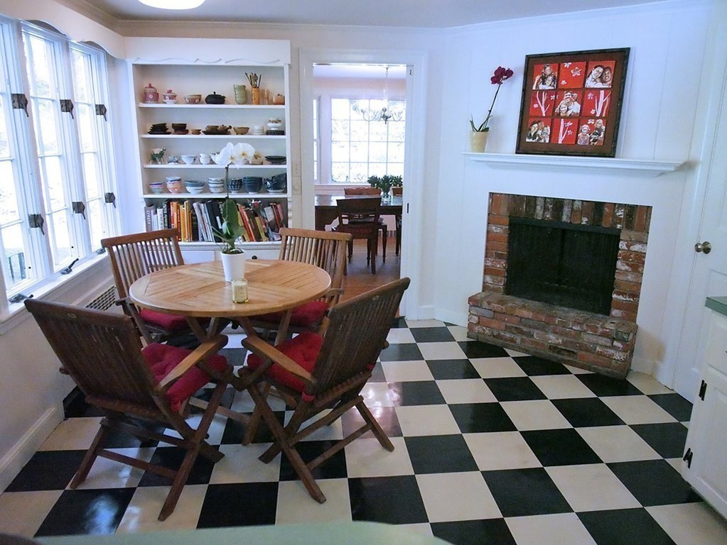 52 Montvale Road Weston, MA 02493 - Photo 12 of 30 a living room with furniture and a fireplace