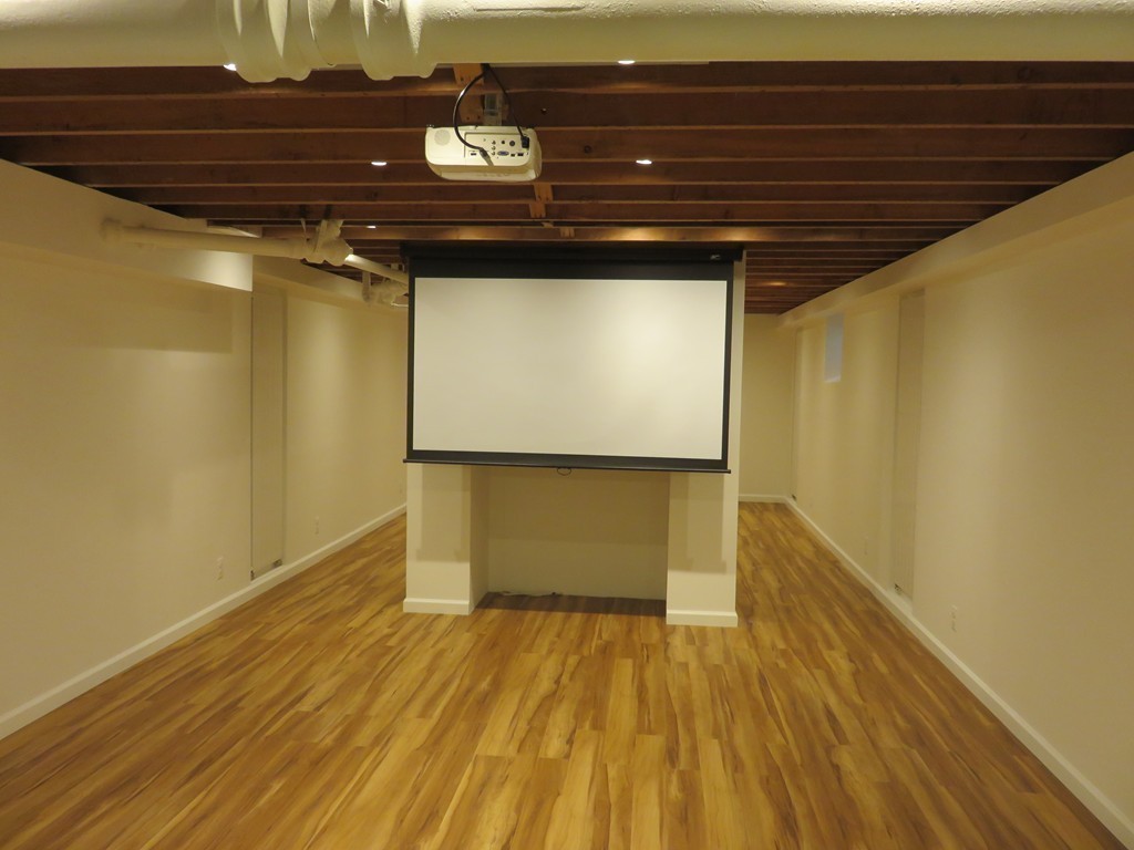 52 Montvale Road Weston, MA 02493 - Photo 22 of 30 a view of room with wooden floor