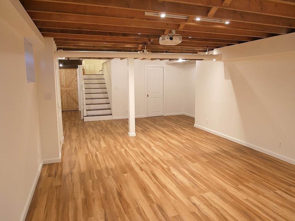52 Montvale Road Weston, MA 02493 - Photo 24 of 30 a view of empty room with wooden floor