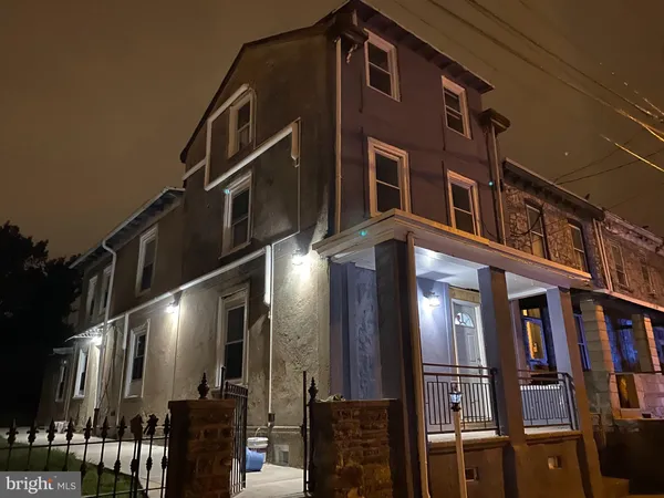 a front view of a building with glass windows