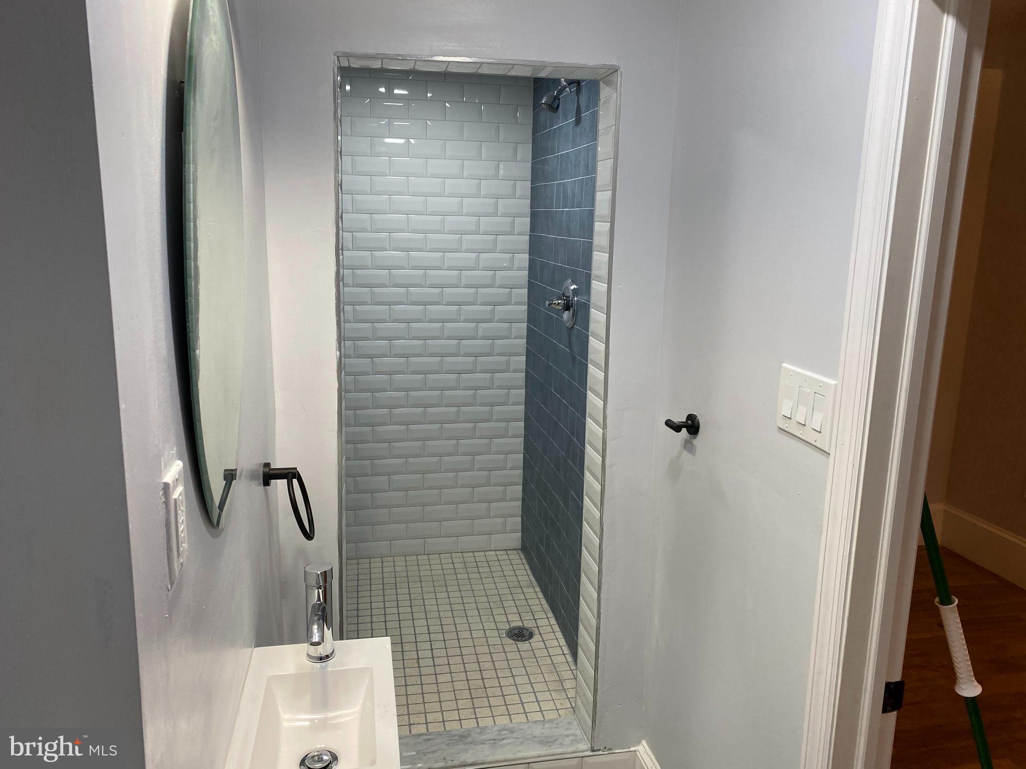 5608 Sprague Street, Unit A Philadelphia, PA 19138 - Photo 2 of 11 a bathroom with a shower