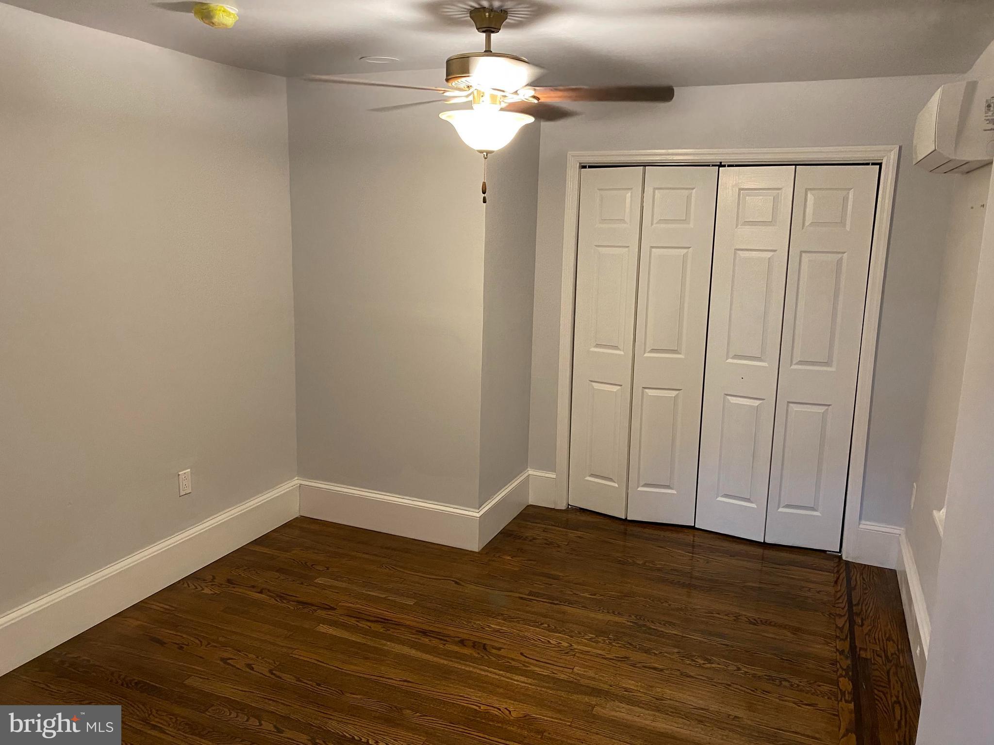 5608 Sprague Street, Unit A Philadelphia, PA 19138 - Photo 5 of 11 a view of an empty room with wooden floor