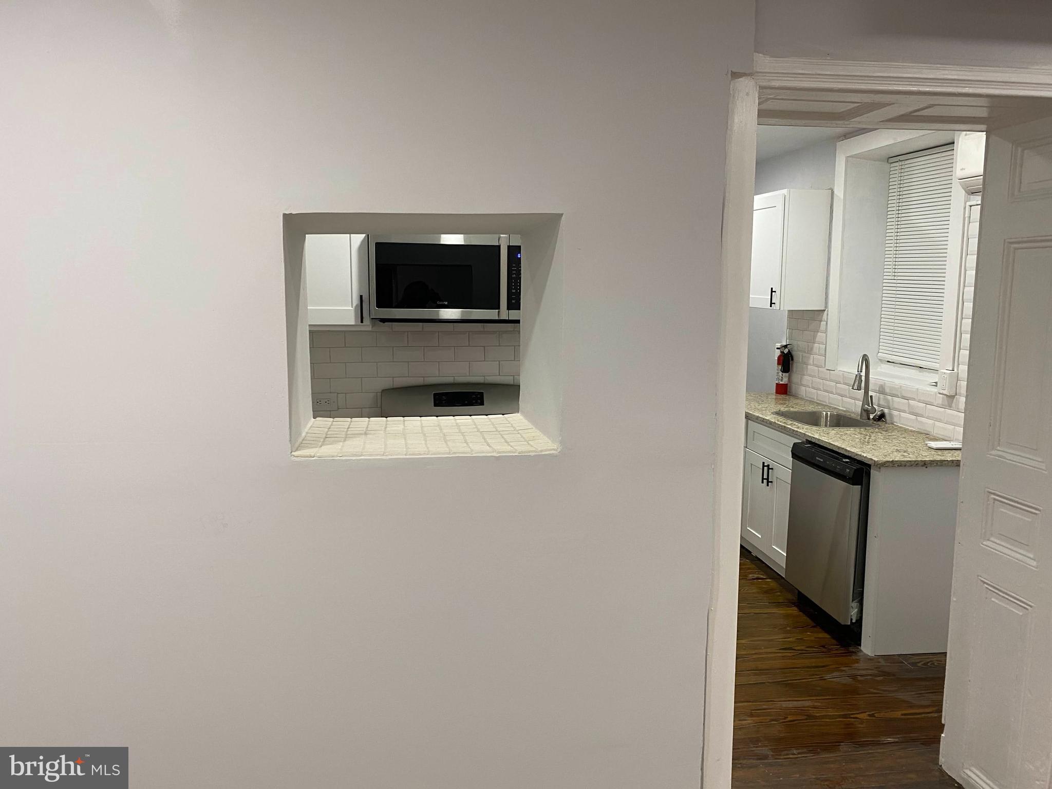 5608 Sprague Street, Unit A Philadelphia, PA 19138 - Photo 7 of 11 a bathroom with a sink and a mirror