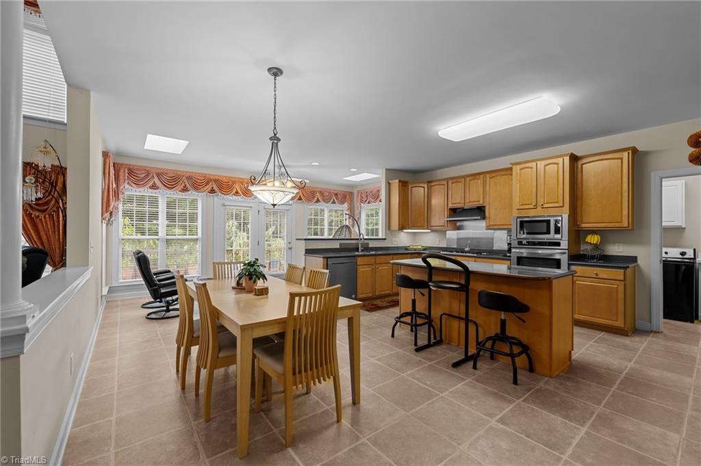701 Number Ten Way Oak Ridge, NC 27310 - Photo 11 of 48 KITCHEN/DINING/SUNROOM