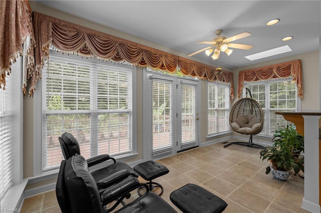 701 Number Ten Way Oak Ridge, NC 27310 - Photo 14 of 48 SUNROOM/SITTING ARE OFF THE KITCHEN