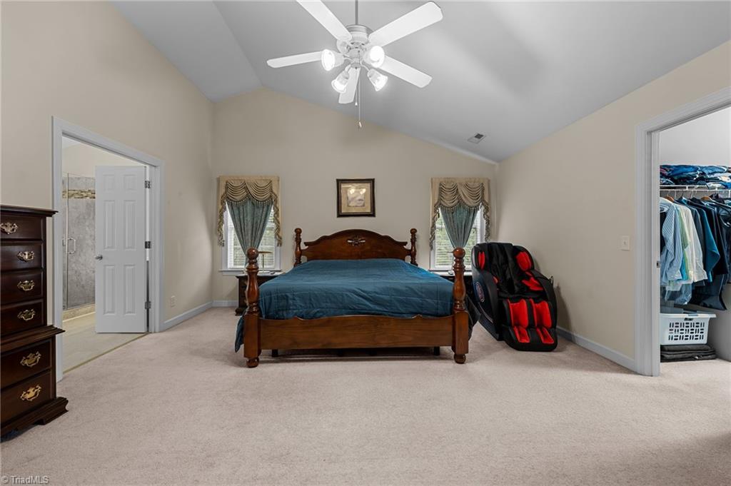 701 Number Ten Way Oak Ridge, NC 27310 - Photo 22 of 48 PRIMARY BEDROOM WITH VAULTED CEILING