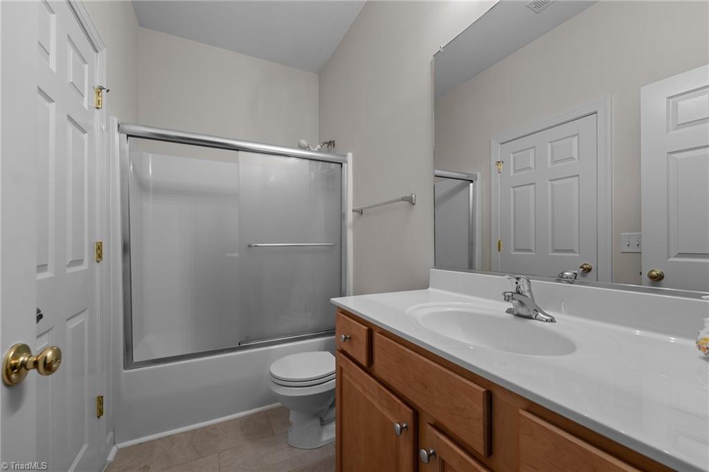701 Number Ten Way Oak Ridge, NC 27310 - Photo 30 of 48 THERE IS A FULL BATH O THE LOWER LEVEL AS WELL