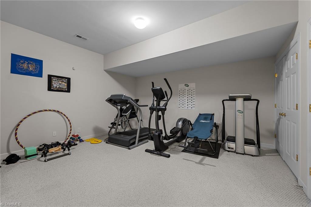 701 Number Ten Way Oak Ridge, NC 27310 - Photo 31 of 48 NO NEED FOR A GYM MEMBERSHIP - THIS HOME HAS AN AREA FOR A HOME GYM