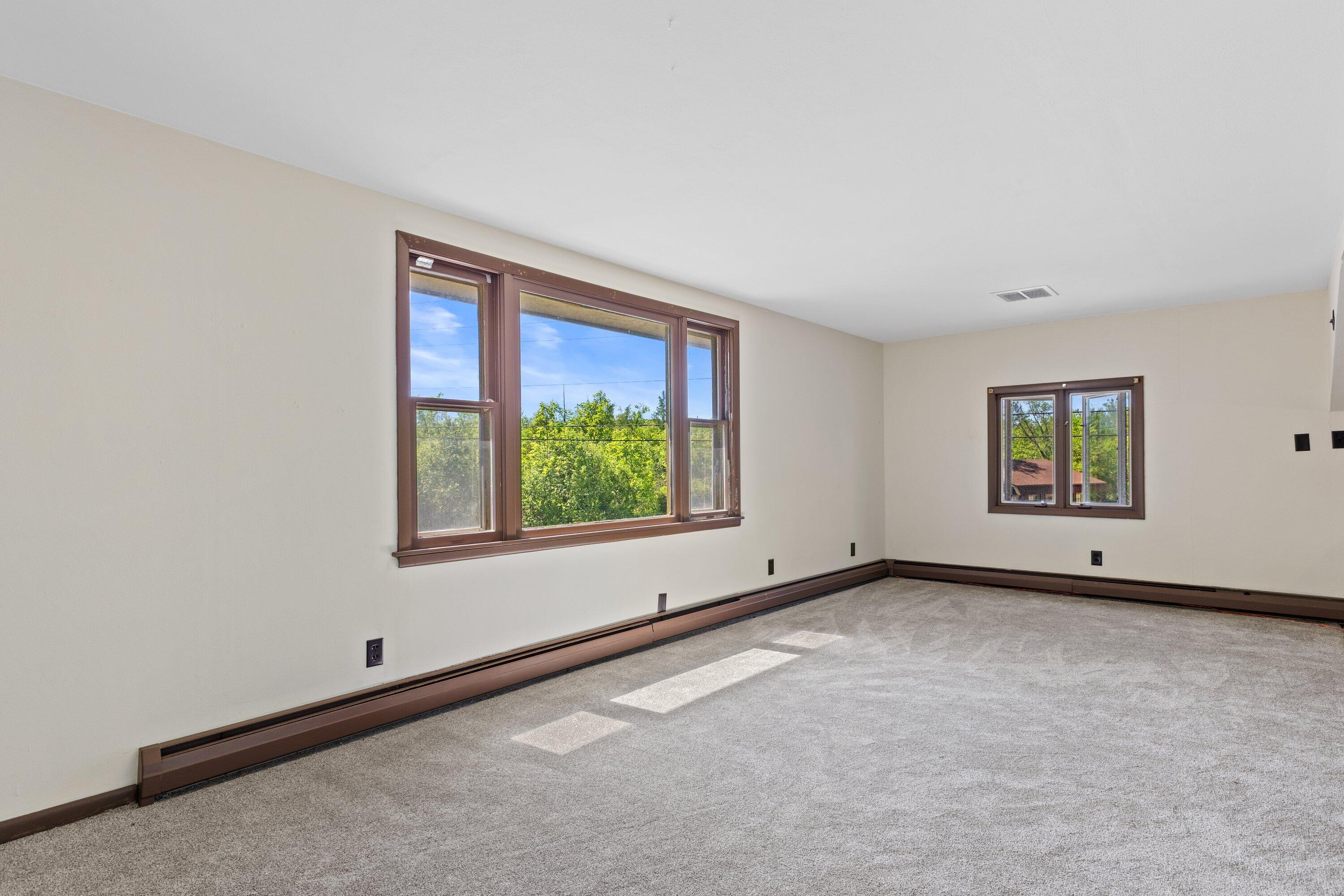 1380 Friess Lake Road Richfield, WI 53033 - Photo 37 of 47 large sunny living room