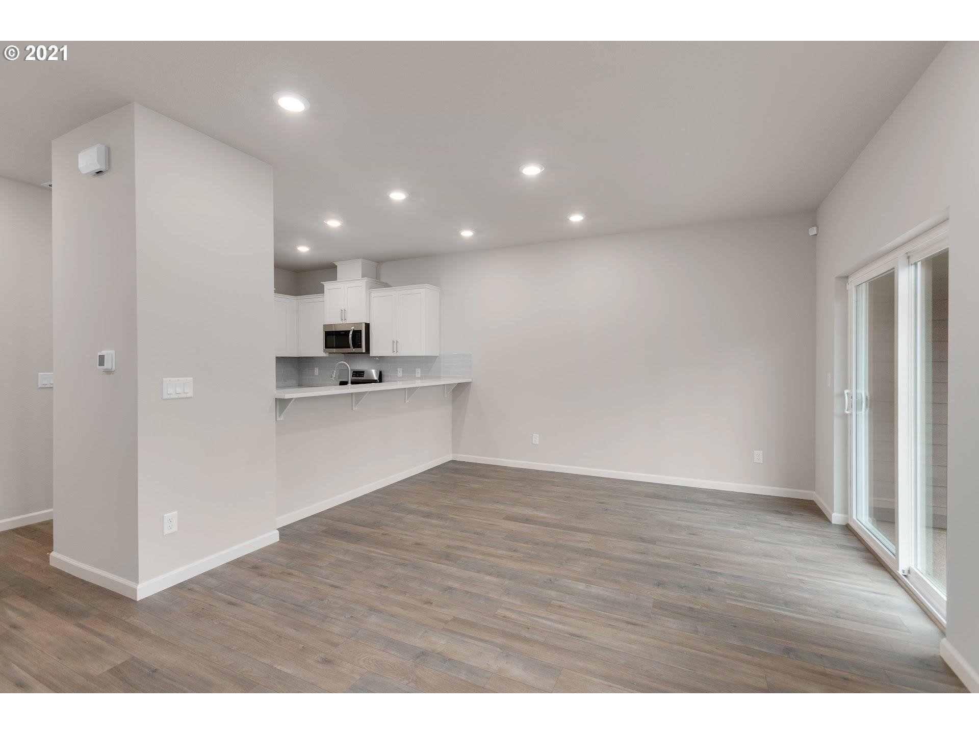 2364 South Brookside Place Ridgefield, WA 98642 - Photo 20 of 28 a view of kitchen with wooden floor