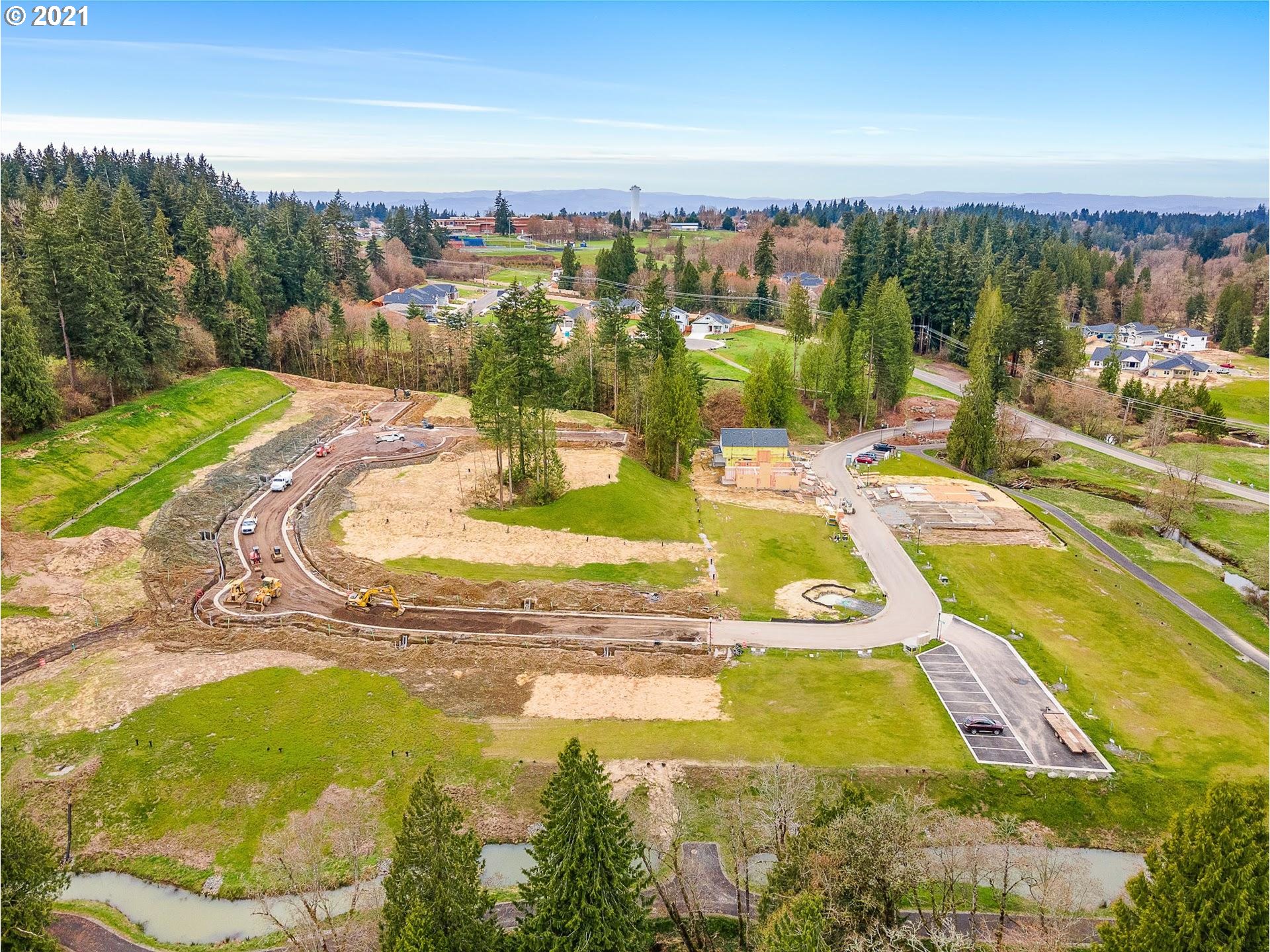 2364 South Brookside Place Ridgefield, WA 98642 - Photo 24 of 28 a view of a swimming pool with an ocean view