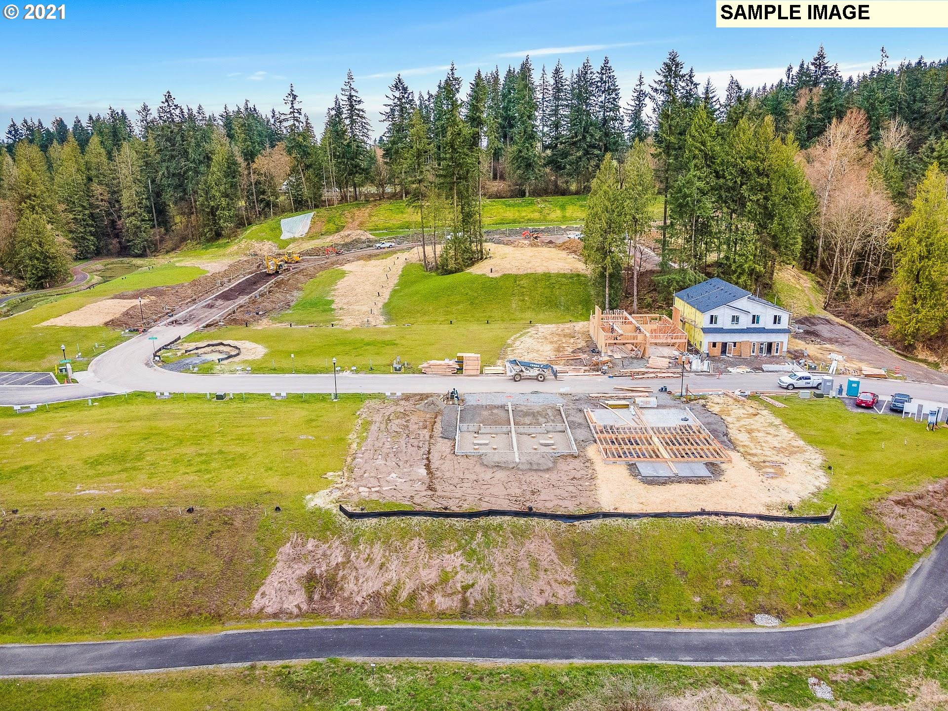 2364 South Brookside Place Ridgefield, WA 98642 - Photo 27 of 28 a view of a swimming pool with an ocean view