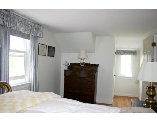 13 Lincoln Road Wayland, MA 01778 - Photo 20 of 21 a bedroom with a bed and a window