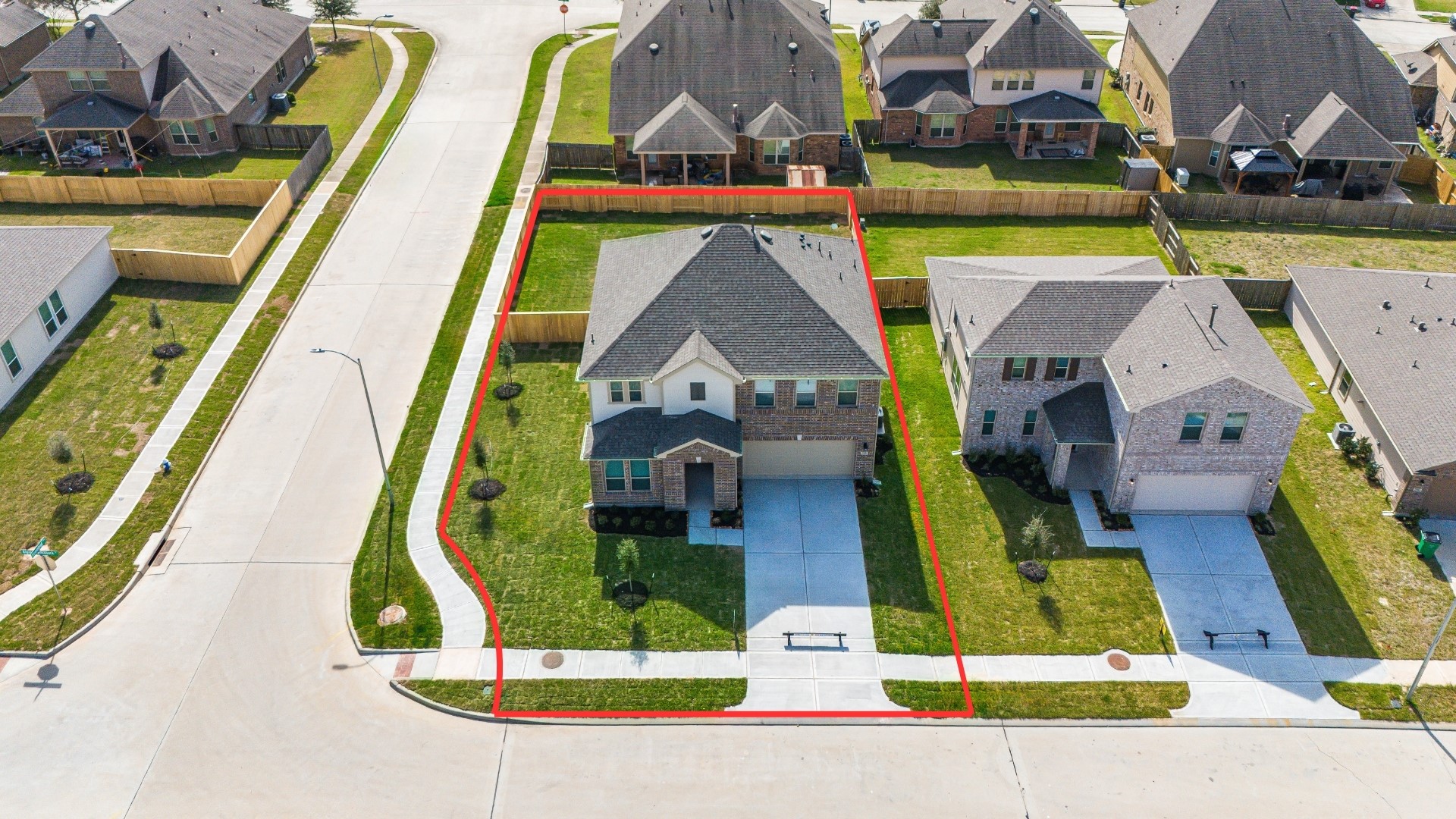 25503 Alpine Switchback Drive Spring, TX 77373 - Photo 2 of 32 Amazing aerial shot of this gorgeous KB Home home situated on a large CORNER LOT. Featuring lush landscaping, well manicured front lawn and a wonderful back.