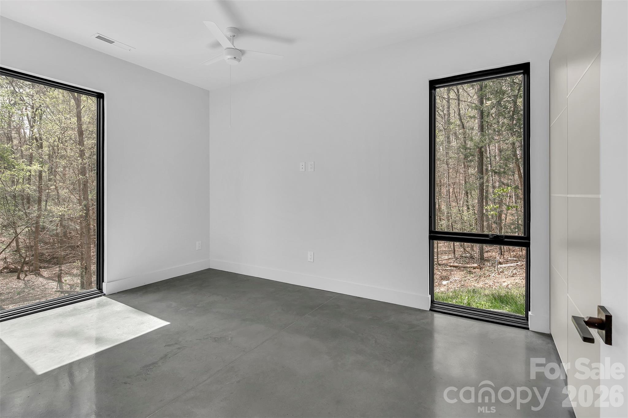 386 Squirrel Lane Clover, SC 29710 - Photo 36 of 45 an empty room with windows