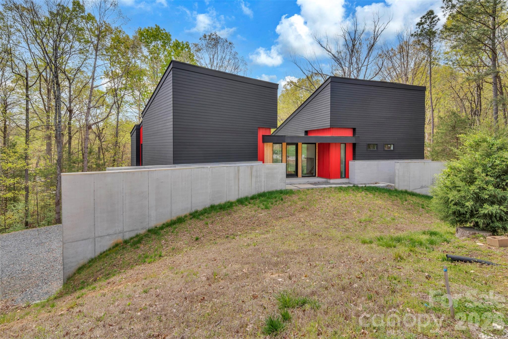 386 Squirrel Lane Clover, SC 29710 - Photo 7 of 45 a backyard of a house with lots of green space