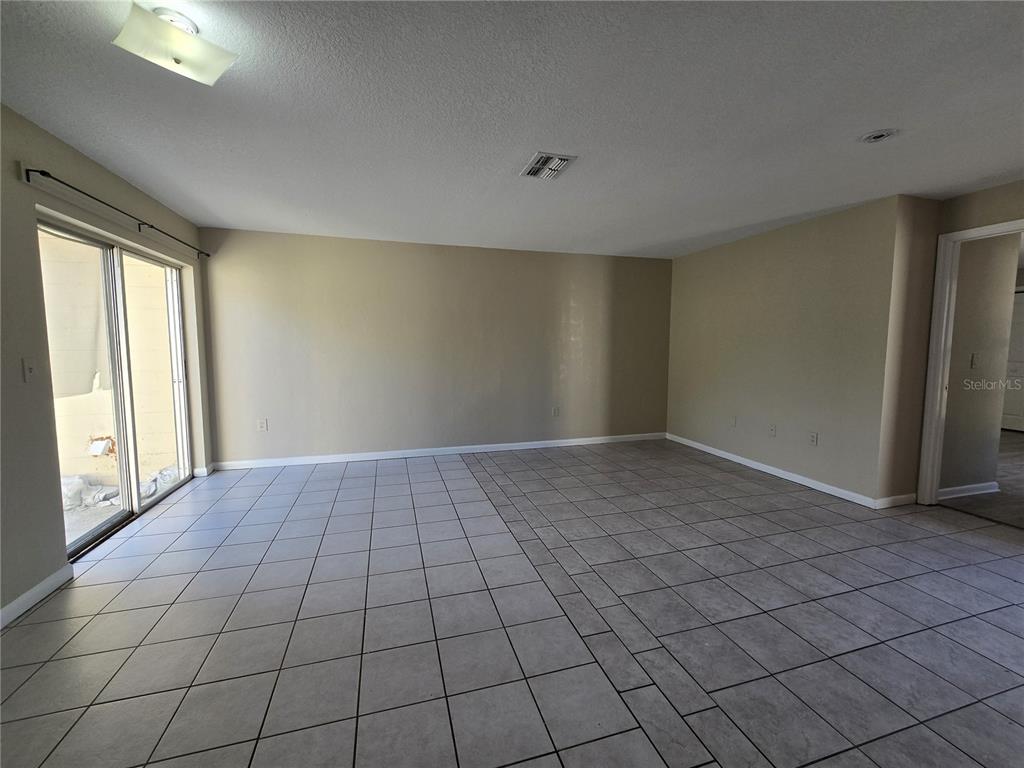 4634 Dail Road Lakeland, FL 33813 - Photo 5 of 10 a view of an empty room and window