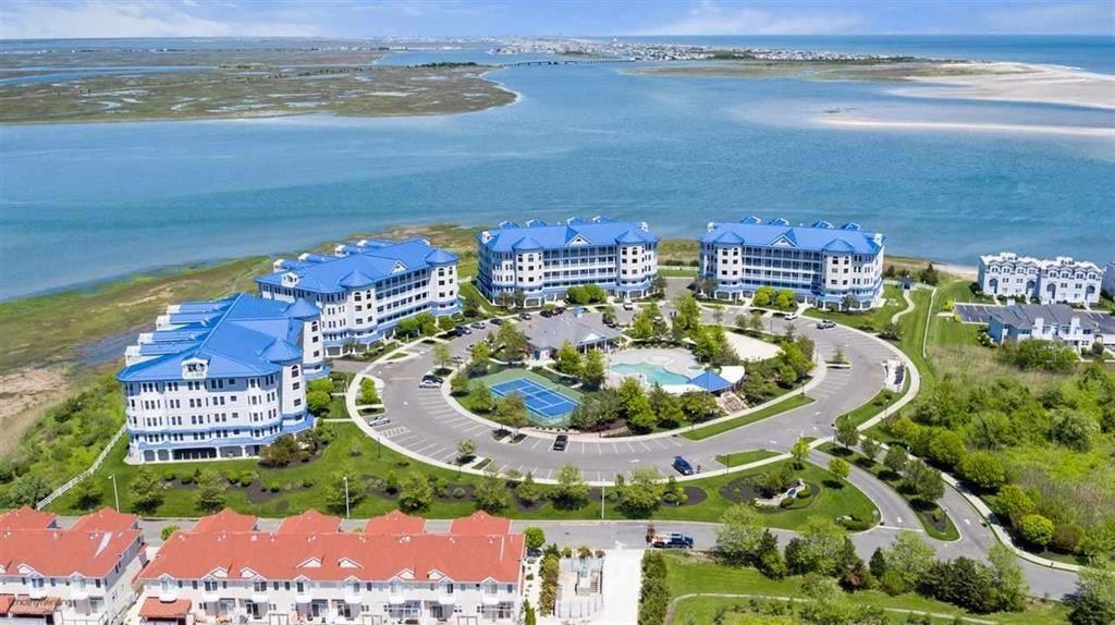 2103 Seaboard Circle, Unit 2103 North Wildwood, NJ 08260 - Photo 1 of 42 a view of a lake with a mountain in the background