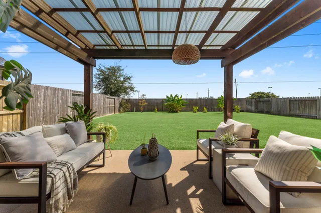a outdoor living space with furniture and garden view