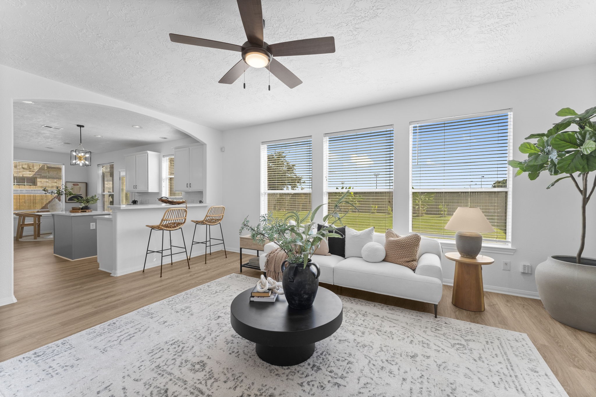 21418 Avalon Queen Drive Spring, TX 77379 - Photo 12 of 35 a living room with furniture and a large window