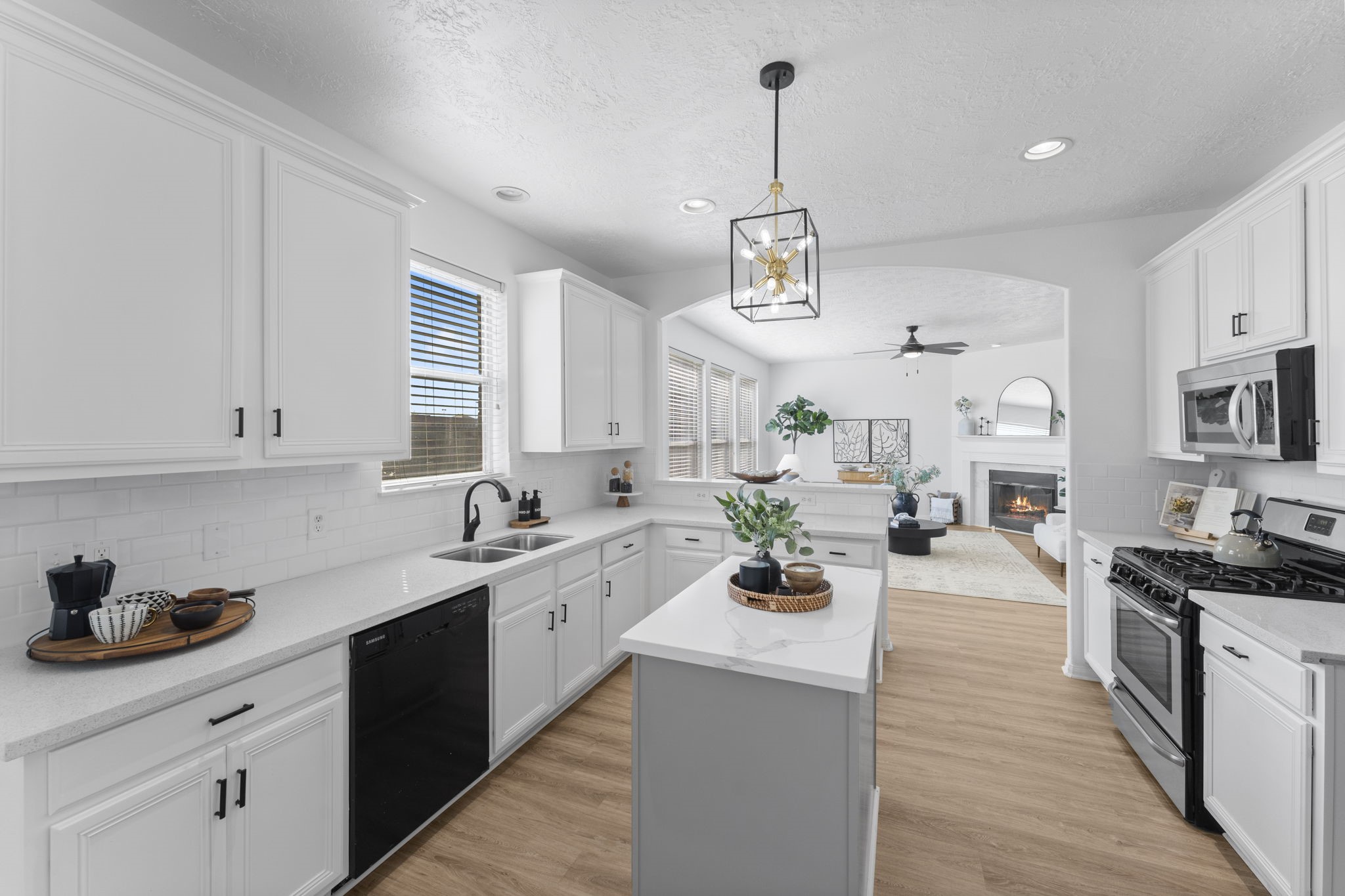 21418 Avalon Queen Drive Spring, TX 77379 - Photo 13 of 35 a kitchen with lots of counter top space and cabinets