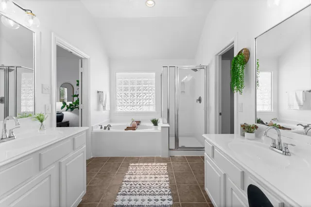 a bathroom with a sink a mirror and a bathtub
