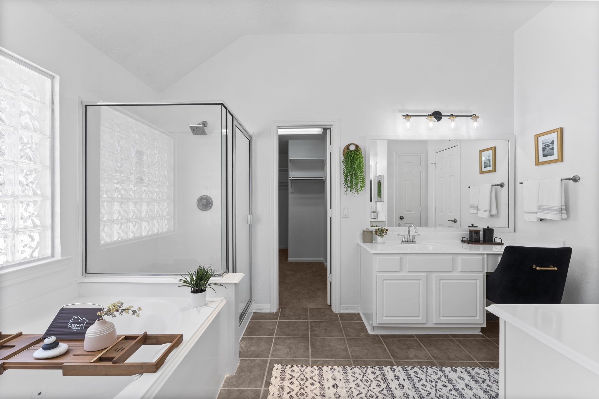 21418 Avalon Queen Drive Spring, TX 77379 - Photo 19 of 35 a spacious bathroom with a tub sink and mirror