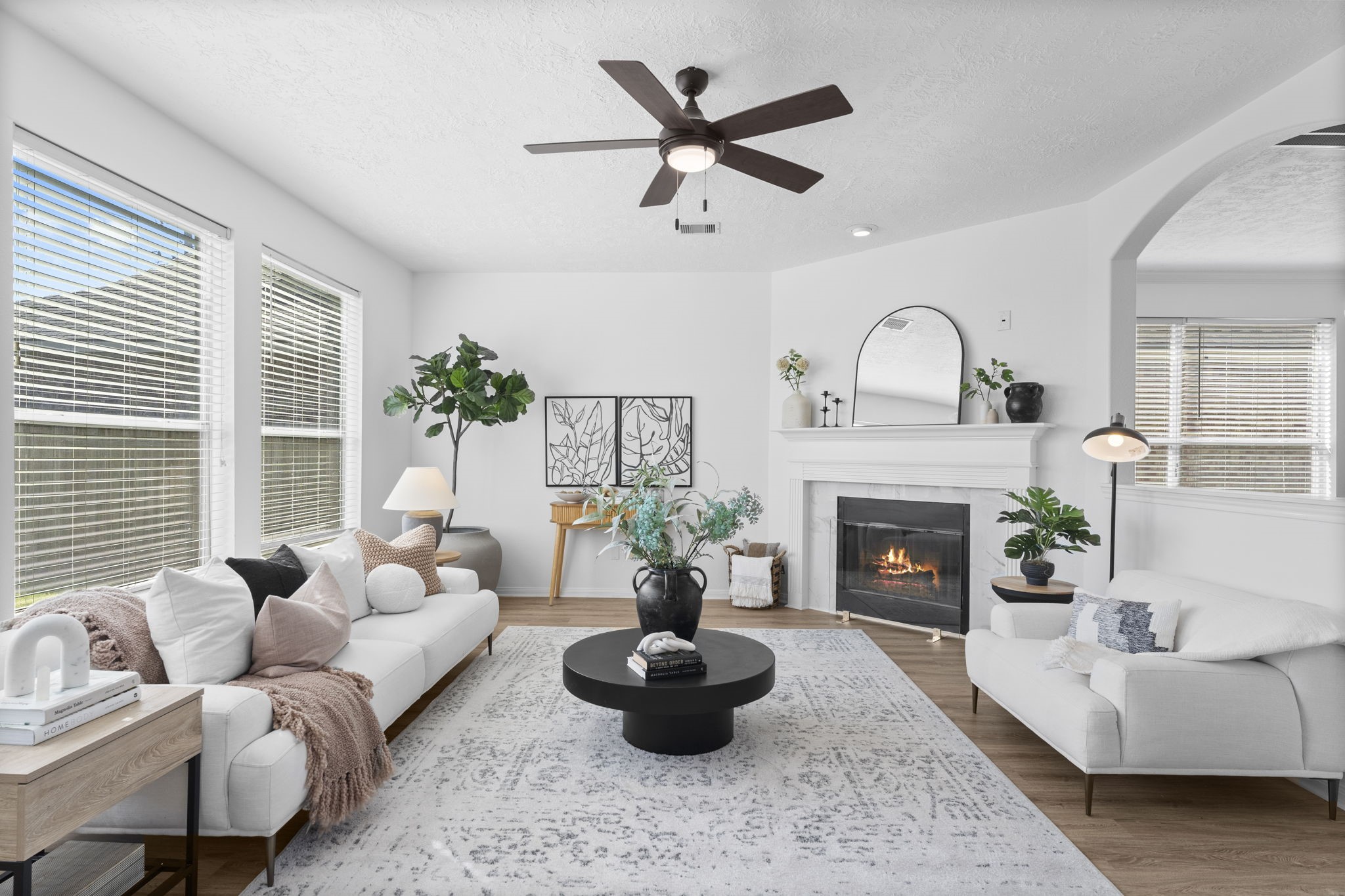 21418 Avalon Queen Drive Spring, TX 77379 - Photo 2 of 35 Cozy up by the fireplace and make memories in this beautiful family room.