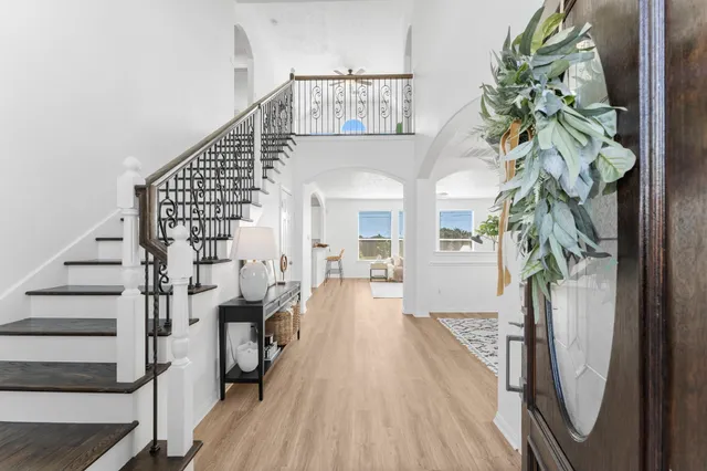 a view of entryway with wooden floor