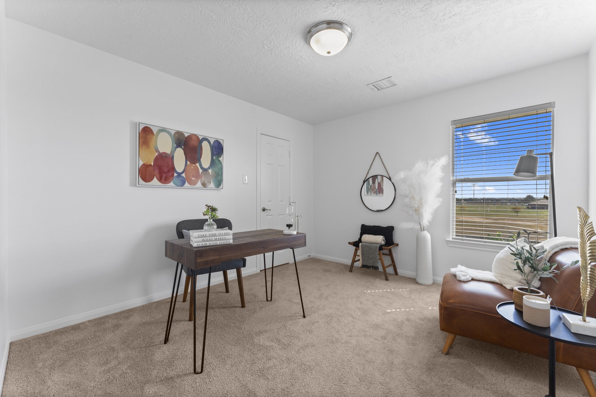 21418 Avalon Queen Drive Spring, TX 77379 - Photo 26 of 35 a view of a work space with furniture and a window