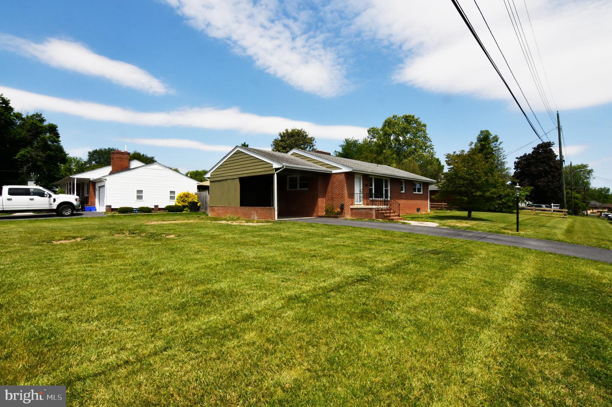 437 Beechcroft Road Winchester, VA 22601 - Photo 7 of 52 a view of a house with a big yard