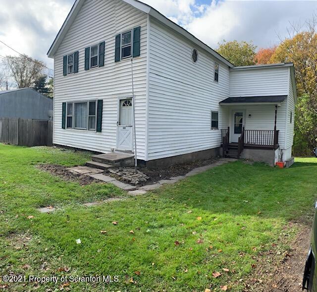 681 Main Street Great Bend, PA 18821 - Photo 1 of 22 a view of a backyard with a garden