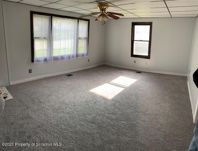 681 Main Street Great Bend, PA 18821 - Photo 16 of 22 an empty room with windows