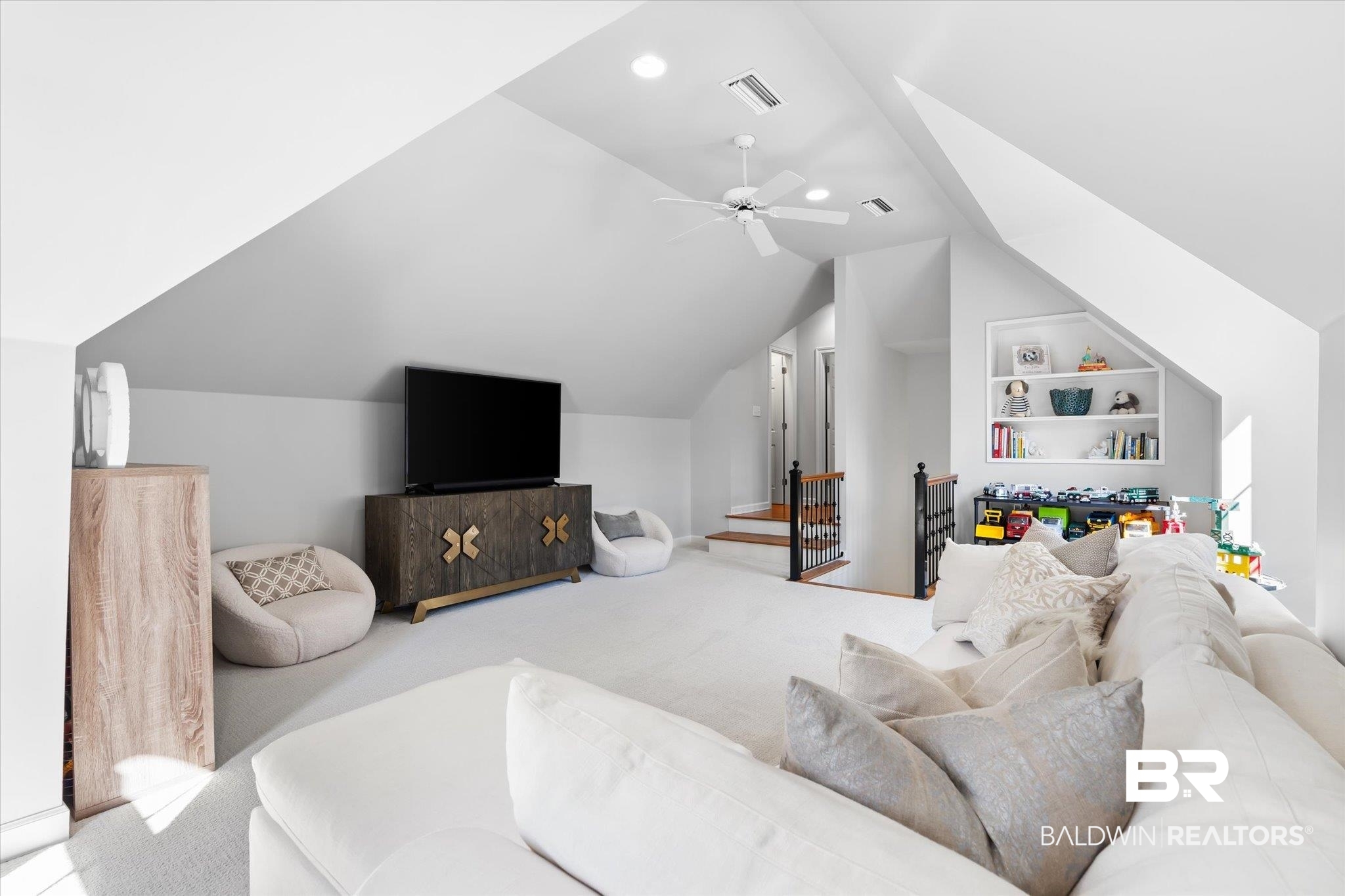 320 Long Court Mobile, AL 36608 - Photo 35 of 61 Carpeted living room with lofted ceiling and ceiling fan