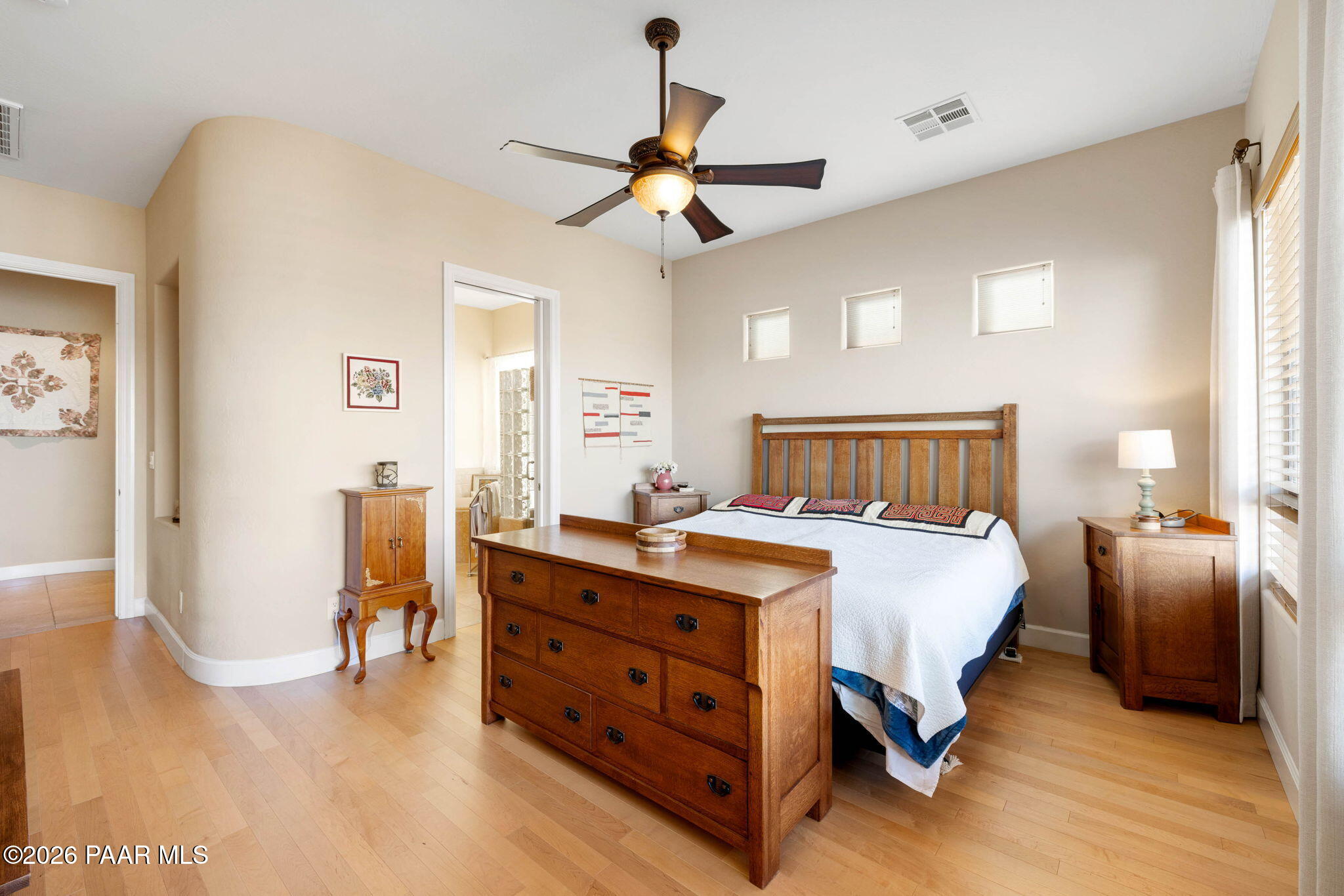 1636 Constable Street Prescott, AZ 86301 - Photo 23 of 41 a bedroom with a bed and wooden floor