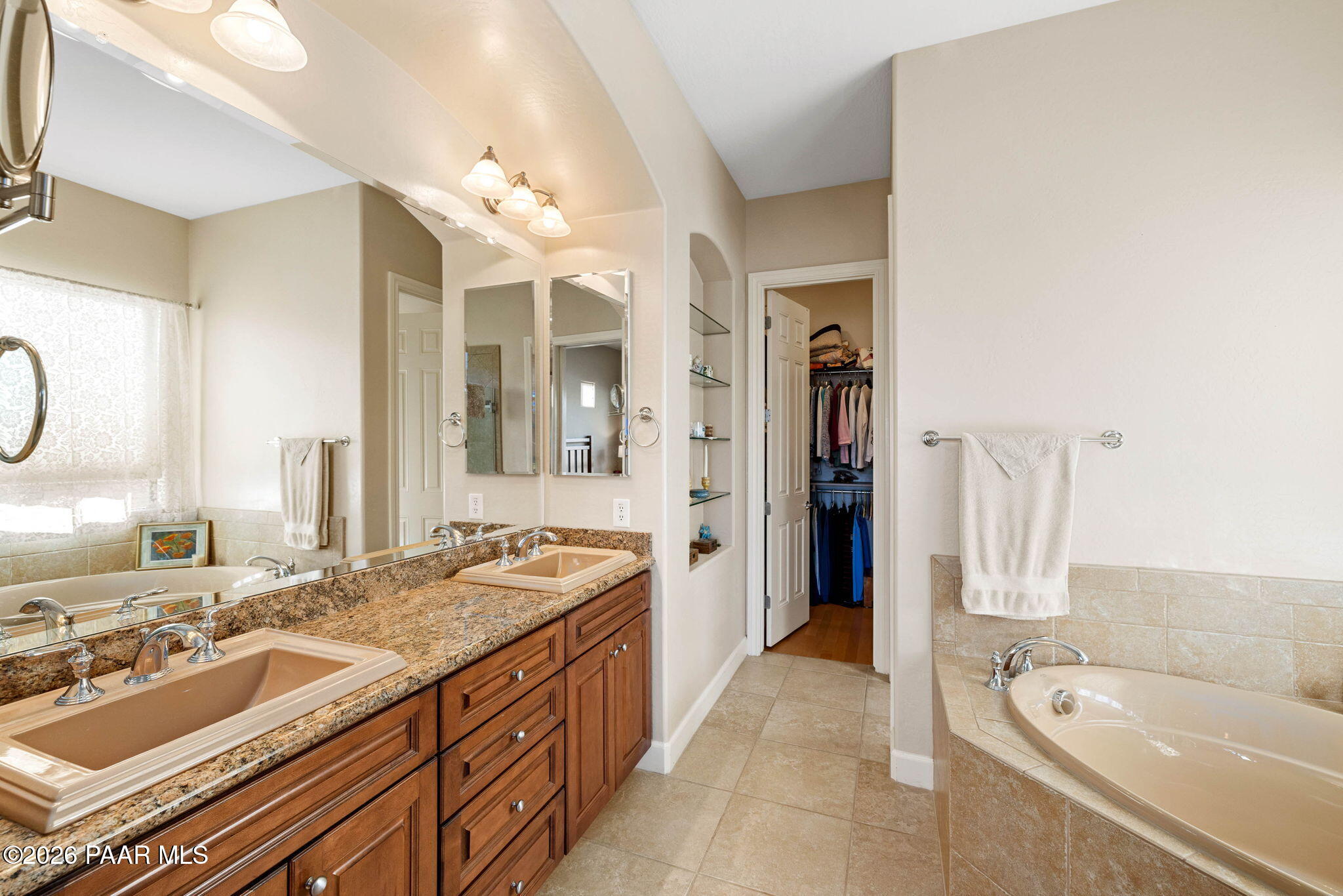 1636 Constable Street Prescott, AZ 86301 - Photo 24 of 41 a spacious bathroom with a tub sink and mirror