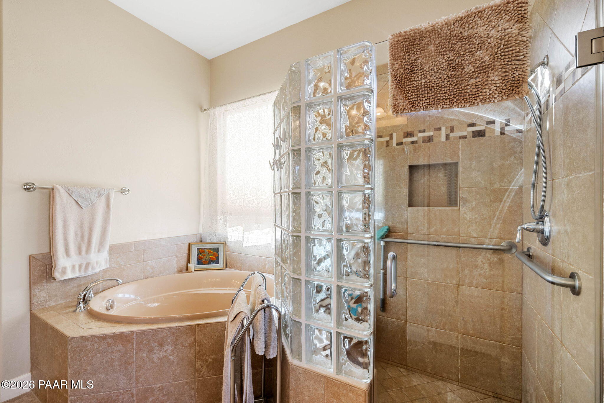 1636 Constable Street Prescott, AZ 86301 - Photo 25 of 41 a bathroom with a tub sink and mirror